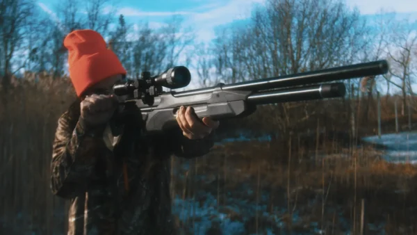 Crosman Prospect CPP2RS Being Cocked and Fired by a Hunter in a Snowy Field