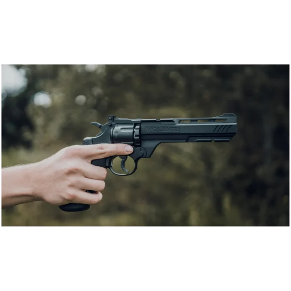 Crosman Vigilante CO2 Revolver Air Pistol with user holding and pointing the pistol lifestyle picture